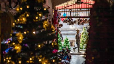 Christmas trees on sale in the northern Syrian city of Raqqa. AFP