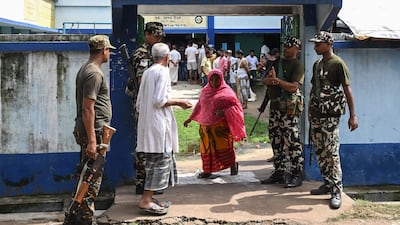 Paramilitary personnel guard a polling station on the outskirts of Kolkata during local elections in India's West Bengal state. AFP