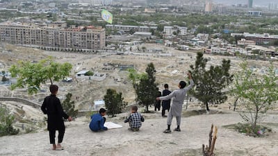 Boys prepare to fly kites during a kite battle on a hillside in Kabul, Afghanistan. All photos by Wakil Kohsar / AFP