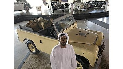 Abdullah al Shawi with his Land Rover, made in the late 1950s, at the Sharjah Old Cars Club and Museum.