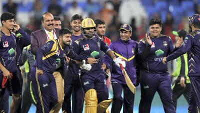 Quetta's Sarfaraz Ahmed is congratulated after hitting a four to win the game against Lahore.