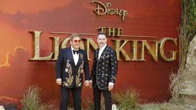 Elton John and David Furnish attend the premiere of Disney's 'The Lion King' in London's Leicester Square on July 14, 2019. AFP