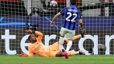 AC MILAN RATINGS: Mike Maignan - 6. Let down by his defence for the Nerazzurri's two early goals but he came up with important saves to deny Dzeko and Brozovic in the second half. Reuters