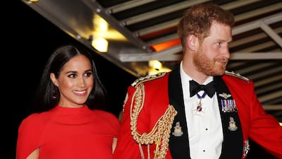Meghan and Prince Harry arrive to attend the Mountbatten Music Festival at the Royal Albert Hall, London, in March 2020. Getty Images