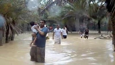People walking through flood water as they evacuate a flooded area during a cyclone in the Yemeni island of Socotra in May. Luban is the second cyclone to strike Yemen this year. AFP