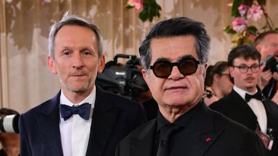 French producer Philippe Martin, left, and Iranian filmmaker Jafar Panahi. AFP