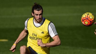 Real Madrid's Gareth Bale kicks the ball during a training session at Valdebebas Sport City in Madrid on November 7, 2015 on the eve of their Liga's football match against Sevilla. AFP PHOTO/ PIERRE-PHILIPPE MARCOU