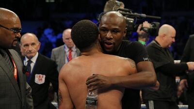 Gervonta Davis celebrates with Floyd Mayweather Jr after winning defending his IBF super-featherweight title against Britain's Liam Walsh at the Copper Box Arena in London on Saturday, May 20, 2017. Andrew Couldridge / Action Images