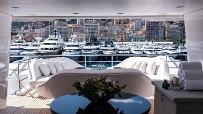Furniture sits on the stern deck of luxury superyacht Secret, manufactured by Abeking & Rasmussen, during last month's Monaco Yacht Show. Bloomberg