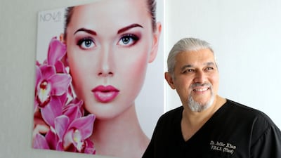 On work days Dr Jaffer Khan's driver ferries him around in a BMW 7 Series to gives him time to read notes and catch up. Chris Whiteoak / The National