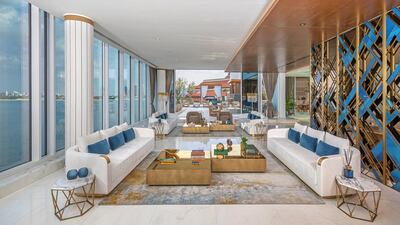 The living room at a penthouse on the Palm, designed by Hazel Wong - the architect behind Emirates Towers. Courtesy of Palma Holding