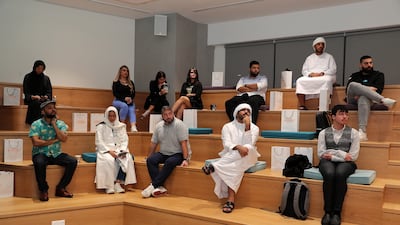Students listen to one of the speakers