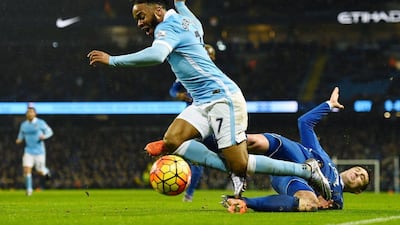 Raheem Sterling of Manchester City is challenged by John Stones of Everton during their Premier League match at the Etihad Stadium on January 13, 2016 in Manchester, England. (Photo by Laurence Griffiths/Getty Images)