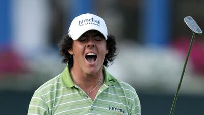 Rory McIlory reacts after winning the Dubai Desert Classic. AFP