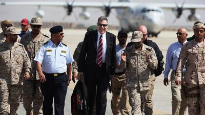 Mr Tueller arrives at an air base for a military ceremony in Mukalla. AP Photo