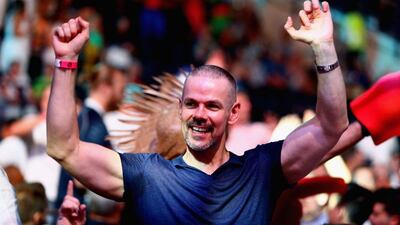 A fan gets into the spirit of the Dubai Duty Free Darts Masters. Francois Nel / Getty
