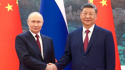 Mr Putin told Mr Xi that Russian-Chinese relations were a model partnership. EPA
