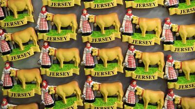 Jersey-themed fridge magnets depicting a Jersey cow, in St Helier, Jersey. The island has a long acquaintance with the UAE. AFP