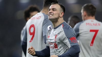 Liverpool's Xherdan Shaqiri celebrates scoring their third goal in a 3-1 win over Burnley at Turf Moor. Reuters