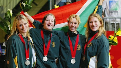 Charlene Wittstock, left, in South Africa's swimming team training kit, at the Commonwealth Games on August 4, 2002, in Manchester, England. Getty Images