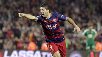 Barcelona striker Luis Saurez celebrates after one of his three goals against Eibar in La Liga on Sunday. Marta Perez / EPA / October 25, 2015