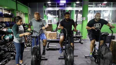 Nuha Al Marri coaches at Crossfit Metalise. Pawan Singh / The National