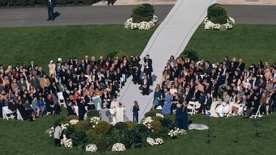 The nearly hour-long ceremony was attended by 250 family members and friends. AP