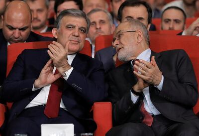 Saadet Party leader Temel Karamollaoglu (right), with former Turkish President Abdullah Gul in Istanbul, Turkey on April 24, 2018. Huseyin Aldemir / Reuters Photo