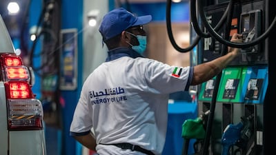 An Adnoc petrol station in Abu Dhabi. Motorists in the UAE will pay less for fuel in December. Victor Besa / The National