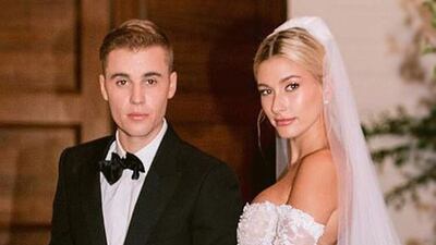 Hailey Bieber married pop star Justin Bieber in 2018 in a figure-hugging, off-the-shoulder, low-backed lace gown designed by Virgil Abloh for Off-White