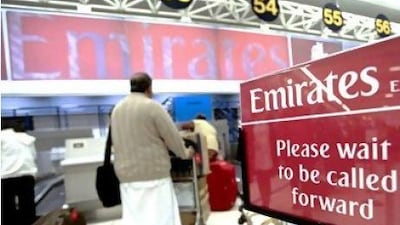 Emirates Airline says travel traffic to the UK during Ramadan is high. Above, a passenger checks in at Manchester airport. Chris Ratcliffe / Bloomberg News