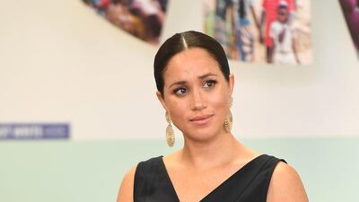 The royal wore a black Everlane jumpsuit for the occasion. EPA