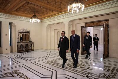 Syria's Foreign Minister Asaad Al Shibani, left, with US Ambassador to Turkey and Special Envoy for Syria, Thomas Barrack, in Damascus, on Wednesday. EPA