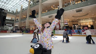 A special system delivers snow fluid up to the roof space to hanging trusses with machines that create the artificial snow. Chris Whiteoak / The National
