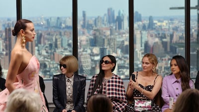 Model Irina Shayk presents a creation from the Carolina Herrera Autumn/Winter 2024 collection as Vogue editor-in-Cchief Anna Wintour, Demi Moore, Diane Kruger and Becky G attend the show during New York Fashion Week. Reuters