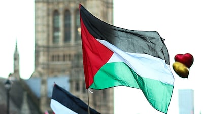 A Palestinian flag during a National March for Palestine in central London on December 9, 2023. AFP