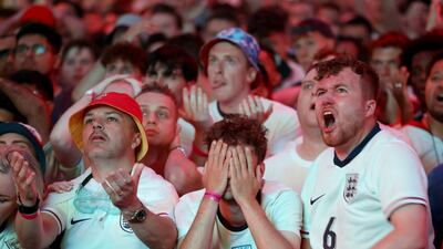 Dejected England fans react at Box Park Wembley in London during a screening of the Uefa Euro 2024 final between Spain and England. PA