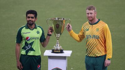 Pakistan captain Babar Azam, left, and South Africa's Heinrich Klaasen pose with the T20 series at the Gaddafi Cricket Stadium in Lahore. EPA