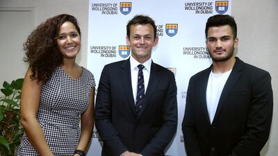 Adam Gilchrist, centre, on Sunday visited the University of Wollongong in Dubai to present the university’s third annual sports award named after him. This year’s recipients were swimmer Sarra Lajnef and cricketer Shivank Vijaykumar. Courtesy of Communicate Gulf