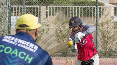 Mohammed Faraazuddin trains with his coach Shiraz Ahmed at JSS International School. Ruel Pableo / The National