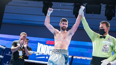 Rocky Fielding has his hands raised following his victory over Emmanuel Danso.