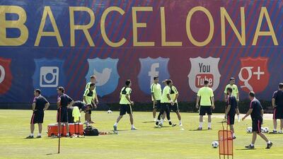 Barcelona's players attend a training session on Tuesday ahead of the Champions League final in Berlin on Saturday. Albert Gea / Reuters