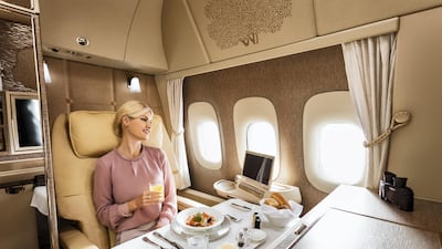 Dining in first class. Courtesy Emirates