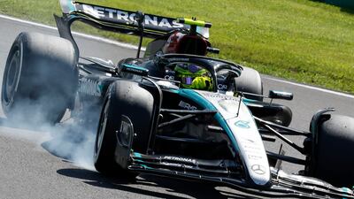 Mercedes' Lewis Hamilton brakes. AP