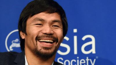 Manny Pacquiao of the Philippines has won an unprecedented eight world titles. Timothy A Clary / AFP