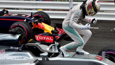 Lewis Hamilton celebrates with his team after winning the Monaco Grand Prix. Andrej Isakovic / AFP