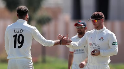 Lancashire's Arron Lilley takes the wicket of UAE's Ali Mirza in a pre season warm up game. Chris Whiteoak / The National