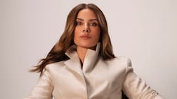 Jacket, Dh6,426; and Bermuda shorts, Dh1,704, both by Max Mara. Bubble bracelets, Dh5,114 each, Alaïa.