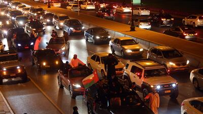Omanis celebrate in Muscat on January 5, 2018 after their national football team won the Gulf Cup of Nations 2017 final against the UAE. Mohammed Mahjoub / AFP