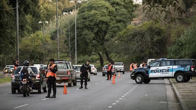 A police checkpoint is seen at the Circunvalacion Avenue in Rosario, Santa Fe, Argentina where football star Lionel Messi and Antonella Roccuzzo will celebrate their wedding on June 30. Marcelo Manera / AFP
